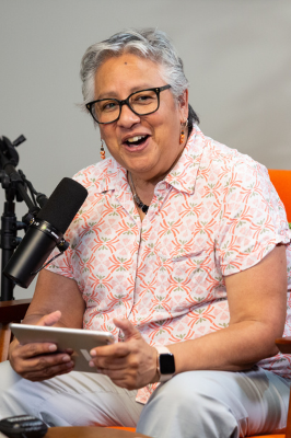 Monique Velasquez co-founder of Velasquez Media speaking on the Change the Reel podcast set Monique Velasquez co-founder of Velasquez Media speaking on the Change the Reel podcast set